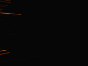 Streaks of light against a dark background